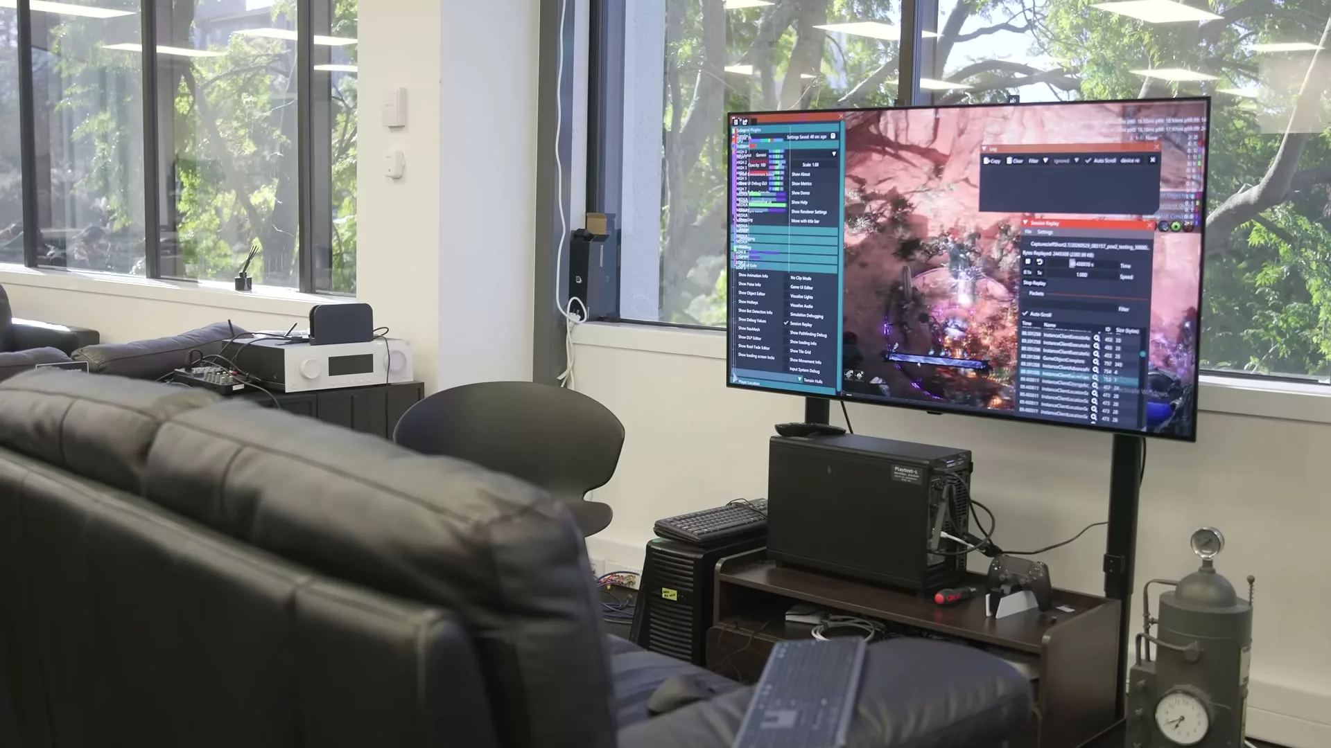 Fenêtre Session Replay ouverte par-dessus Path of Exile 2 dans les bureaux de Grinding Gear Games